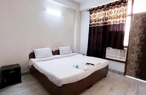 Noida Hotel | Roomshala 117 Shubham Residency - Noida Sector 44