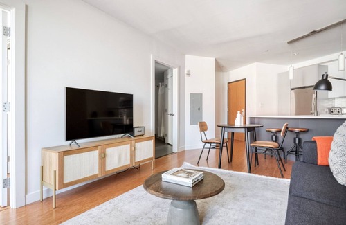 Chinatown Apartment | Roomy Downtown 1BR w/W/D & Gym, nr Greenway, by Blueground
