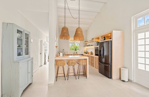 Piscadera Villa | Royal Beach House with sea view and large community pool.
