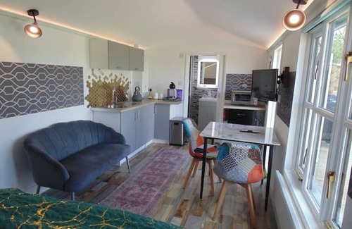 Bury St Edmunds Cabin | Rural Solitary Cabin with deck. In wildflower Meadow. Overlooking nature reserve