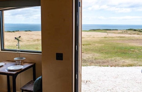 St. Andrews Cabin | Rustic cabin 10, sea views from rewilded farm