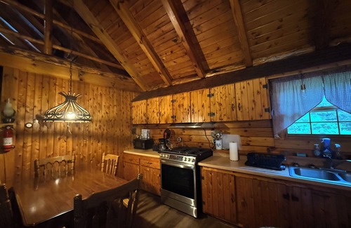 Island Falls Cottage | Rustic Cozy 2-bedroom w/loft Log Cabin in Island Falls surrounded by wildlife