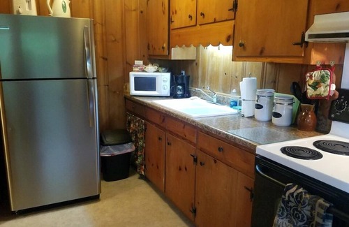 Northwest Ithaca Cottage | Rustic, Cozy Cottage with Backyard Waterfall and Cayuga Lake Views!