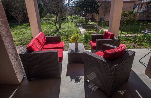 Tomicici Apartment | Rustic Garden Two Bedroom Apartment