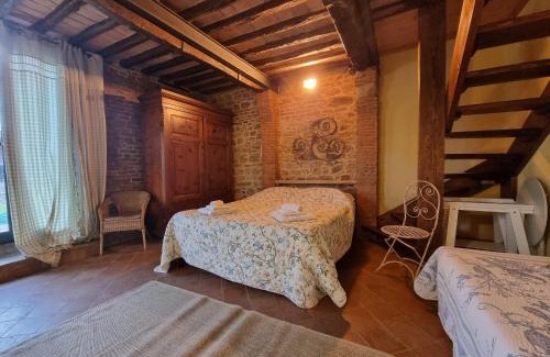 Montecastello House | Rustic holiday home in Pontedera with shared pool