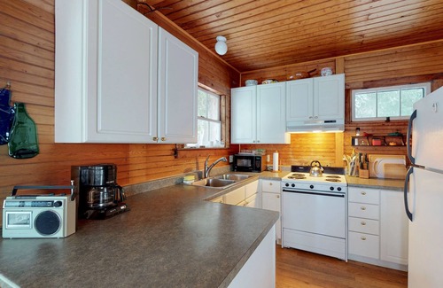 Grand Isle House | Rustic lakefront home with big porch, WiFi & easy water access