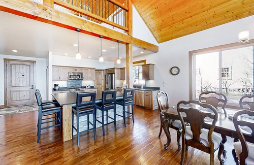 Pagosa Springs House | Rustic lakefront getaway with mountain views - dock, hot tub, fireplace & W/D