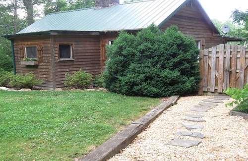 Luray Cabin | Rustic River Cabin, Charming Riverfront, Hottub, 2 Stone Fireplaces, Dock, Views