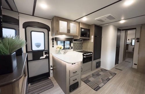 Kenora Resort | RV 4 Luxury Fireplace Bunkhouse Meets High End Camping