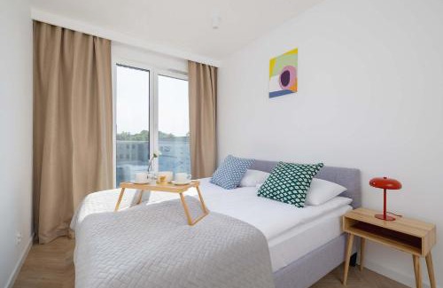 Katowice Apartment | Słoneczna Comfy Apartment with Balcony & Parking Katowice by Noclegi Renters
