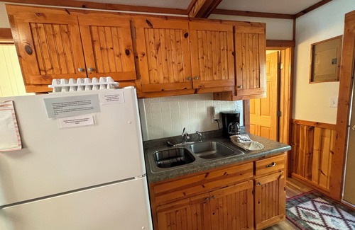 Mercer Cabin | Sand beach, great view, & relaxing fire pit just feet away from the shoreline.