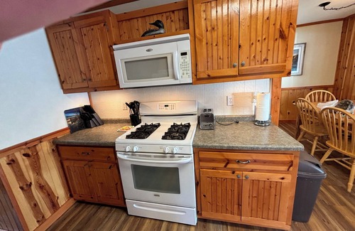Mercer Cabin | Sand beach, great view, & relaxing fire pit just feet away from the shoreline.