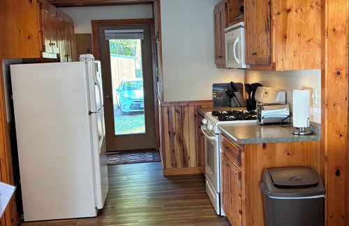 Mercer Cabin | Sand beach, great view, & relaxing fire pit just feet away from the shoreline.