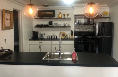 Grand Haven Apartment | Sand suite is perfect for summer fun! Pets considered with fee.