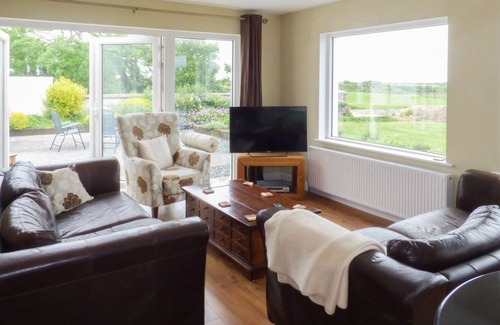 Tacumshane House | SANDERLING LODGE, pet friendly in Tacumshane, County Wexford
