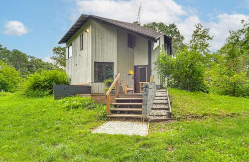 Sand Creek House | Sauna and Porch Writers Croft of Otter Creek Gem