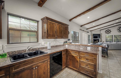 McQueeney House | Scenic Lakefront | Fire Pit + Outdoor Kitchen