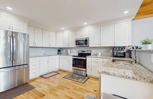 Maynardville House | Scenic lakeview retreat with wraparound deck, vaulted ceilings & game room