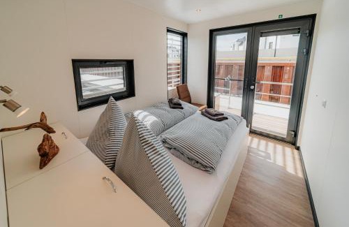 Ostvorpommern House | Schwimmendes Ferienhaus "Trinity" Ihr Seahome auf der Ostsee