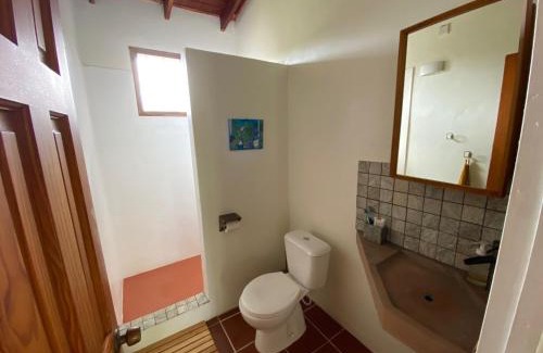Calibishie House | Sea Cliff Eco-Cottages & Gin Distillery