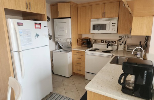 Bethany Beach Condo | Sea Colony garden condo steps to pool & ocean and only a short walk to town.