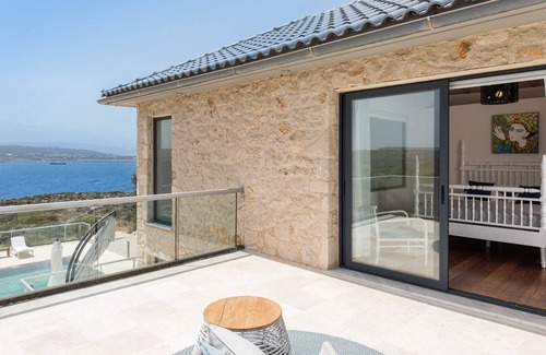 Tersanas Villa | Sea front luxury villa on the edge of the hillside