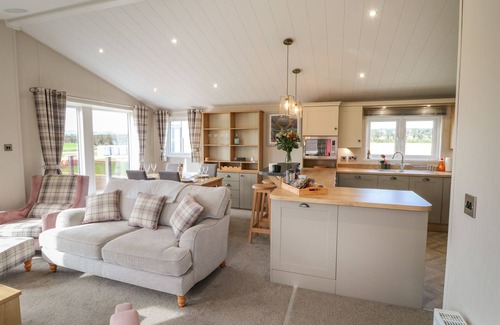 Runswick Bay Cottage | SEA HOLLY LODGE, pet friendly, with a garden in Runswick Bay