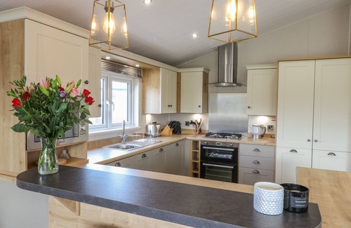 Runswick Bay Cottage | SEA HOLLY LODGE, pet friendly, with a garden in Runswick Bay