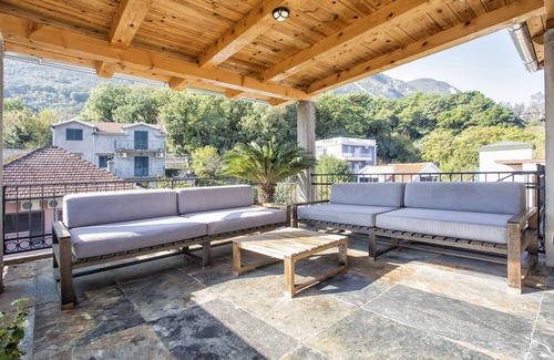Prcanj Apartment | Seafront, traditional Stone Apartment with Mountain Views.