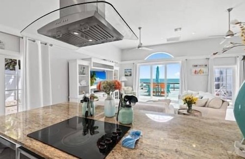 Melbourne Beach Cottage | Seagrape Beachfront Cottage - Direct waterfront, Family and Pet Friendly