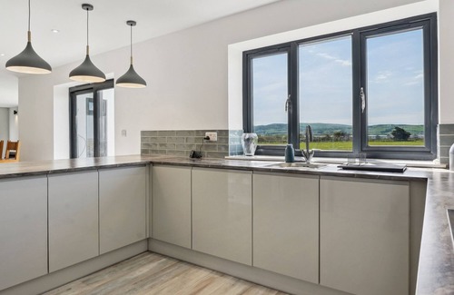 Borth House | Seaside new build holiday home. Beautiful modern family home next to beach
