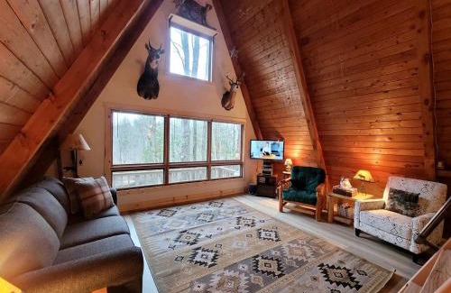 Luther Ski Chalet | Secluded A-Frame Cabin with Private Riverfront on Little Manistee River near Tustin, Michigan