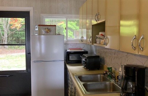 Wetmore Cottage | Secluded Cottage on Stella Lake.Row Boat with private boat landing site