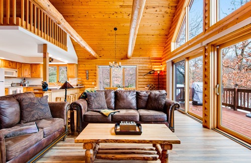 Friendship Cabin | Secluded, dog-friendly home with tree-lined view, firepit, fireplace, & deck