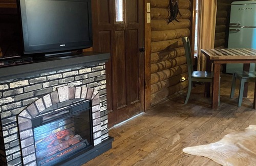 Paluxy Cabin | Secluded Escape with a hot tub, surrounded in nature