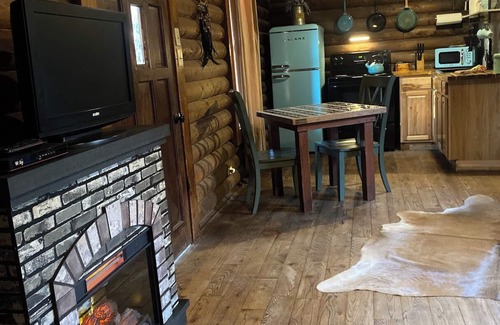 Paluxy Cabin | Secluded Escape with a hot tub, surrounded in nature