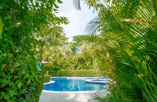 Herradura Apartment | Secluded Garden Paradise Condo @Los Sueños