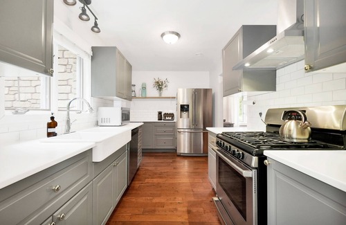Warkworth House | Secluded modern house, 5 forested acres, running stream, hot tub, game room