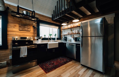 Ferryville Cabin | Secluded Rustic + Modern Log Cabin with hot tub by Stream, luxury getaway