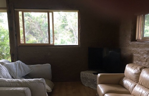 Bellbrae Cabin | Secluded three bedroom mud brick cabin adjacent to the Great Otway National Park