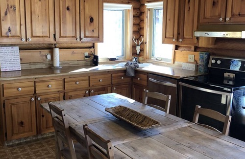 Springfield Cabin | Secluded Washademoak lakefront cove log cabin