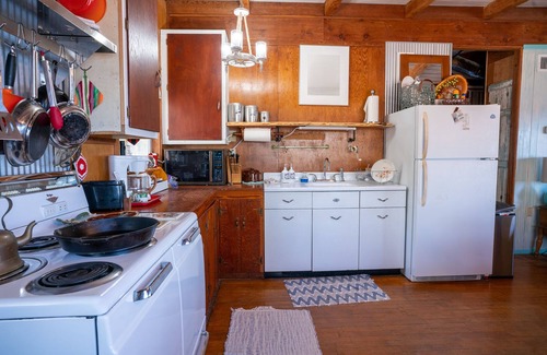 Foley Cabin | Secluded waterfront fishing cabin, boat dock, pier, sunsets, boat to beach