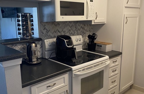 Lowry Field Condo | Seeking a cozy home away from home?