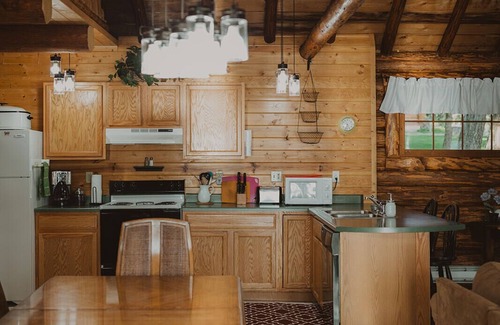 Seeley Lake Cabin | Seeley Cabin at Tamaracks Resort, a log lakefront cabin on Seeley Lake, Montana.