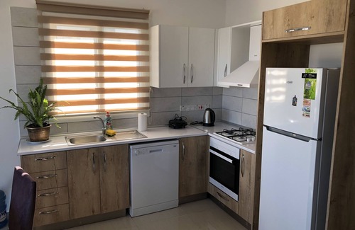 Zeytinlik Apartment | Seker Apartment: Kyrenia City Center. Mountain View. Easy Access.