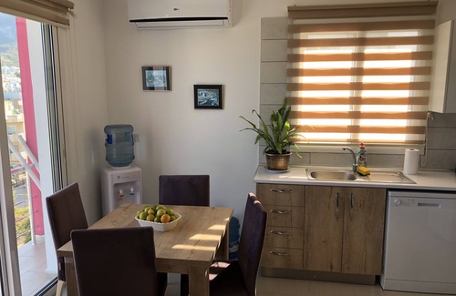 Zeytinlik Apartment | Seker Apartment: Kyrenia City Center. Mountain View. Easy Access.