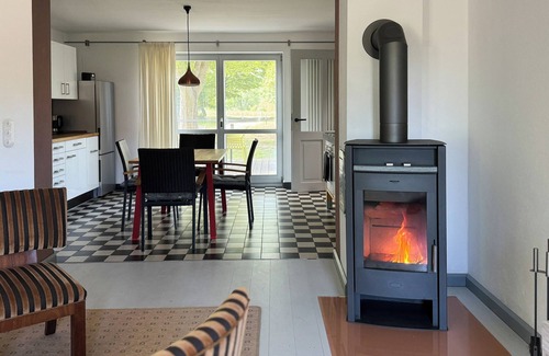 Paewesin House | Semi-detached house on the lake with small garden surrounded by nature