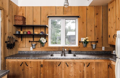 Saint-Calixte Ski Chalet | Serene Lakeside Haven with Spa and Kayak Fun
