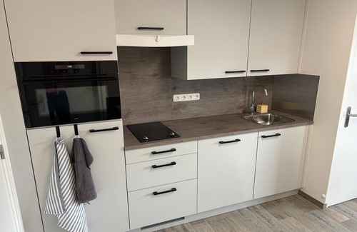 Eikske Apartment | Serene Stay with All You Need