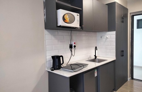 Nairobi West Apartment | Serene studio apartment in beautiful Nairobi near JKIA Airport & SGR, with WiFi